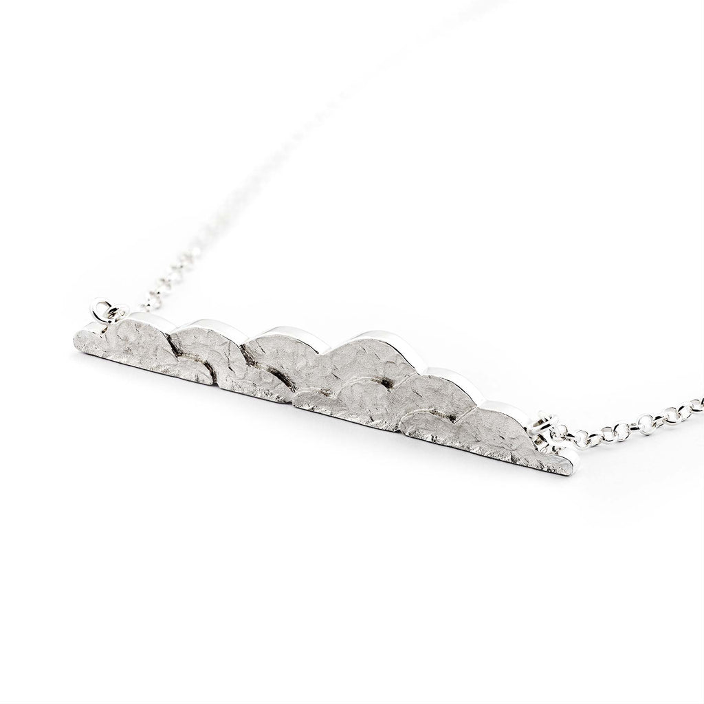 Organic shapes in the  Cloudy silver necklace by goldsmith Anu Kaartinen, Au3 Goldsmiths.
