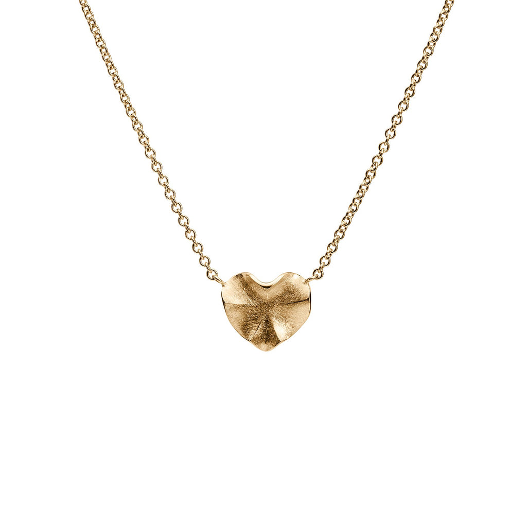 Organic shaped heart necklace in 18K yellow gold, design by Anu Kaartinen.