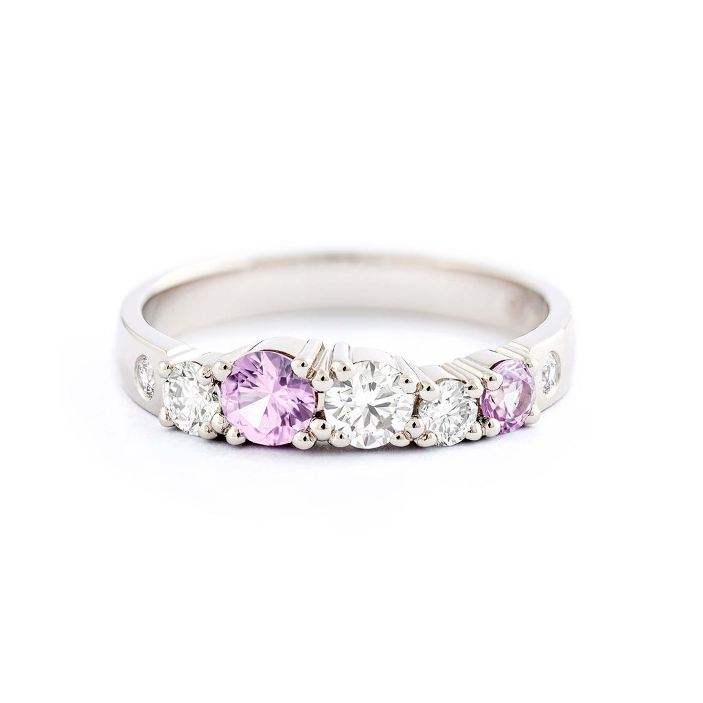 Keto Meadow Spring collection's 3mm wide ring in 750 white gold, with pastel pink sapphires and white tw/vs diamonds. Design by Jussi Louesalmi, Au3 Goldsmiths.