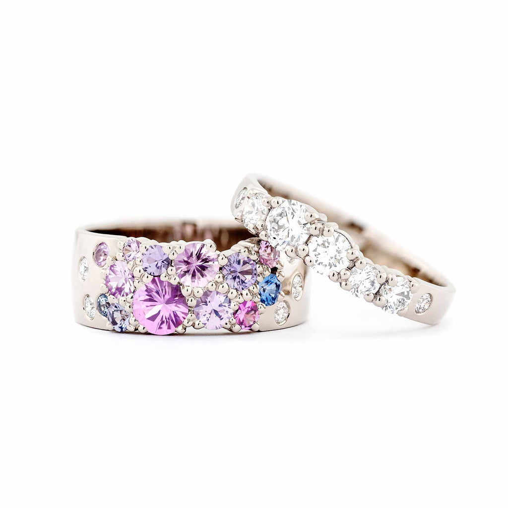 Keto Meadow 7,5mm wide ring and 3mm wide ring in 750 white gold with pink, purple and blue sapphires and white tw/vs diamonds. design by Jussi Louesalmi, Au3 Goldsmiths.