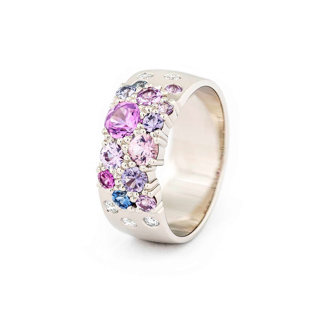 Keto Meadow 7,5mm wide ring in 750 white gold with pink, purple and blue sapphires and white tw/vs diamonds. design by Jussi Louesalmi, Au3 Goldsmiths.