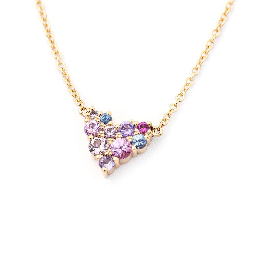 Heart shaped Keto Meadow necklace in 750 yellow gold filled with different size colorful sapphires. Design by Jussi Louesalmi, Au3 Goldsmiths