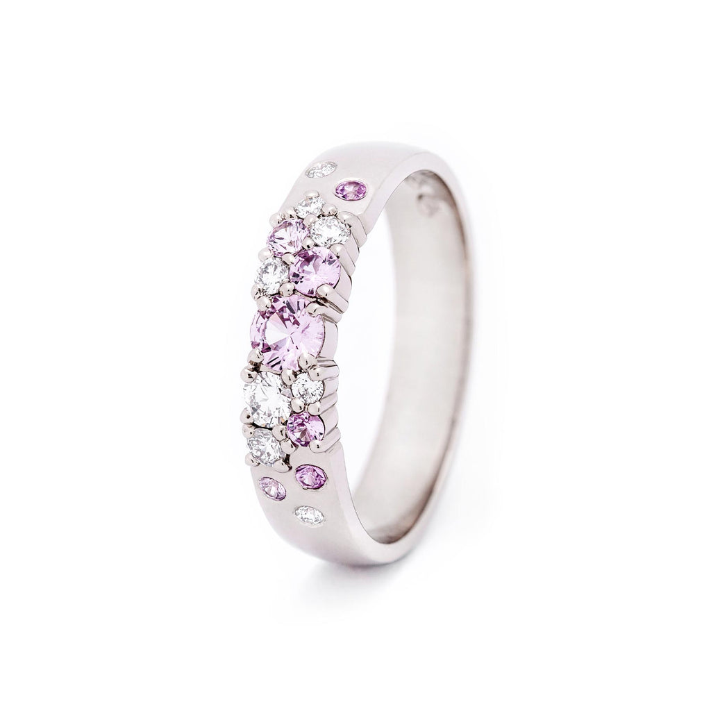 Delicate pastel pink tones in the Keto Meadow Spring collection's 4mm wide ring. Design by Jussi Louesalmi, Au3 Goldsmiths.