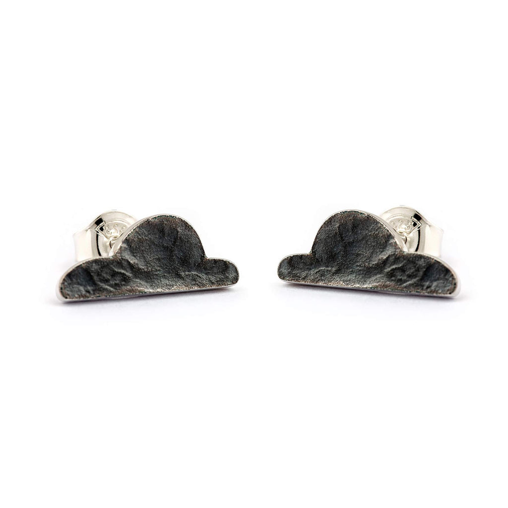 Dark surfaced cloud shape earrings, materials oxidized 925 silver. Design Anu Kaartinen, Au3 Goldsmiths.