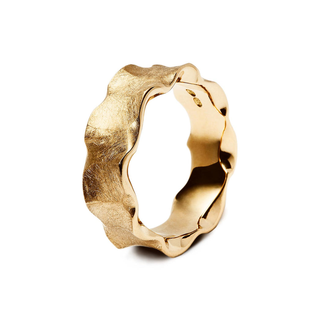 Organic shapes in the golden Hauru ring by goldsmith Anu Kaartinen