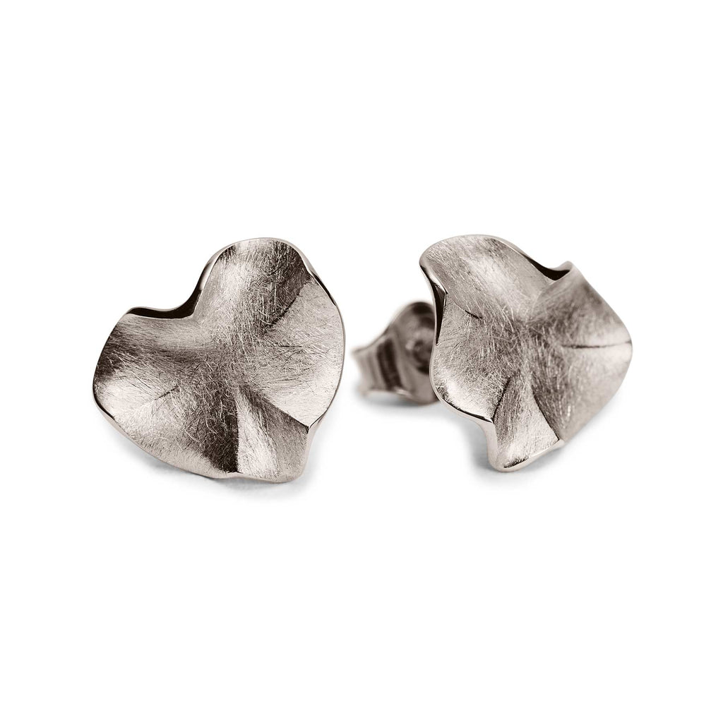 Organic shapes in the Hauru stud earrings made in 18K white gold, design by Anu Kaartinen.