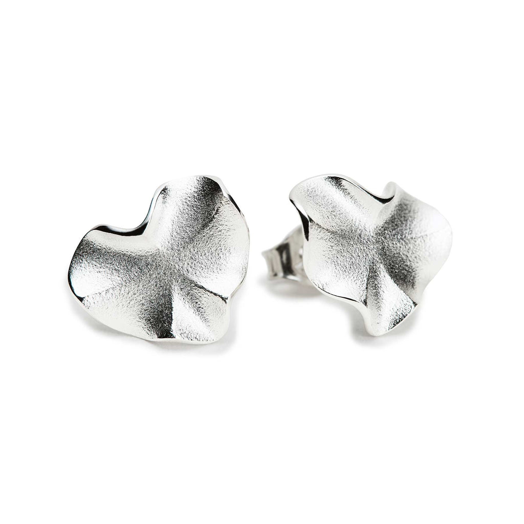 Organic shaped stud earrings made in 925 silver, design by Anu Kaartinen.