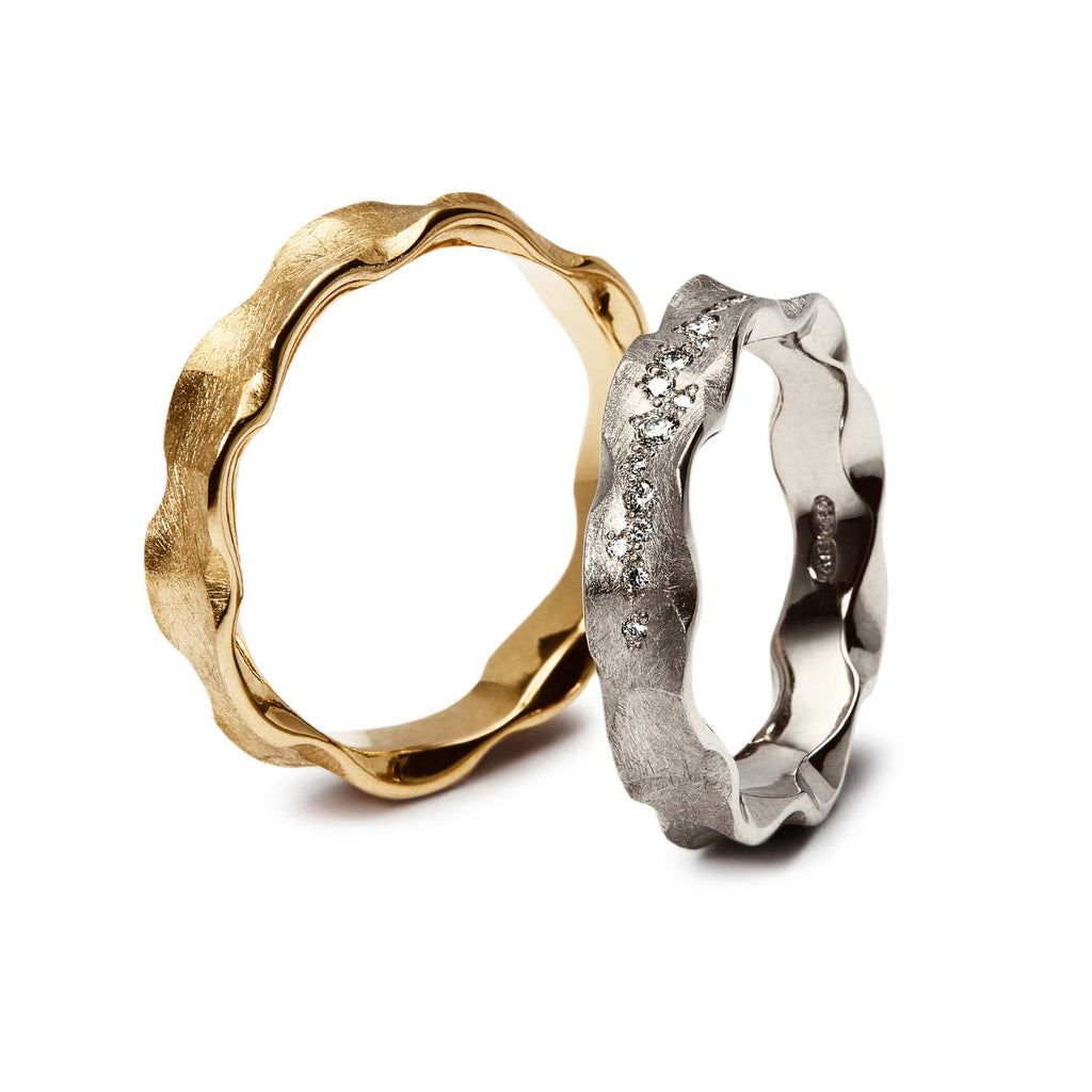 Organic shapes in the Hauru rings made in 18K yellow gold and 18K white gold, design by Anu Kaartinen.