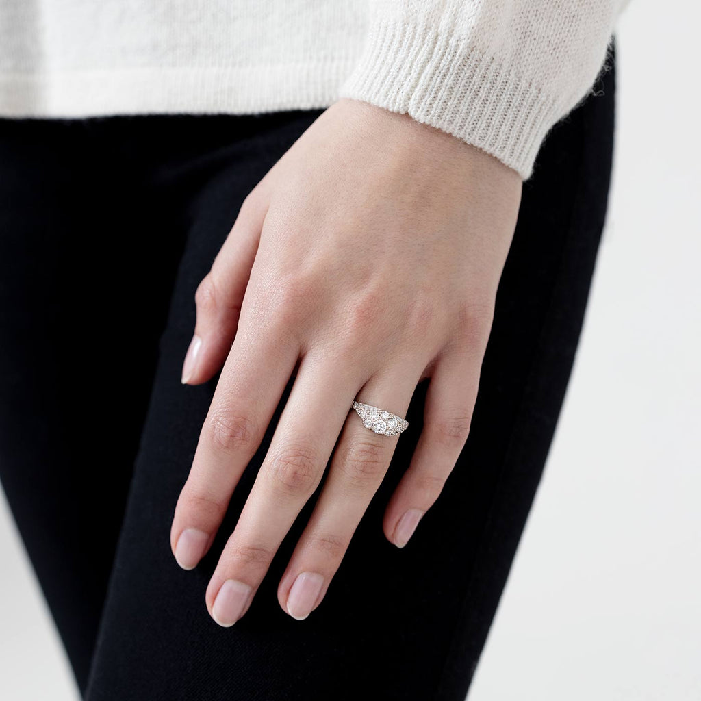 Model wearing a Kaje diamond ring. Design by Jussi Louesalmi, Au3 Goldsmiths.