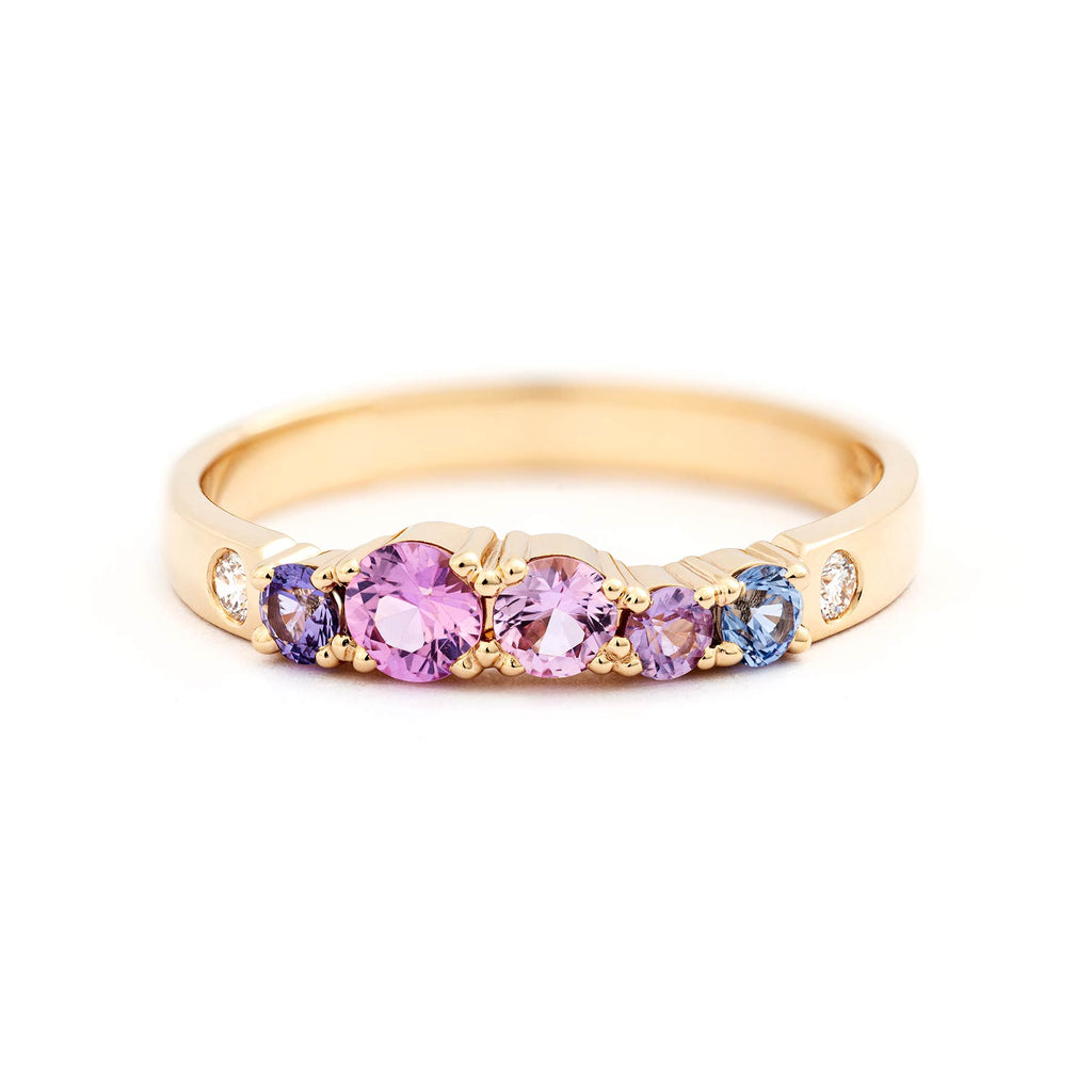 2,5mm wide Keto Meadow ring in 18K yellow gold, with different size colorful sapphires and white tw/vs diamonds.  Design by Jussi Louesalmi, Au3 Goldsmiths.