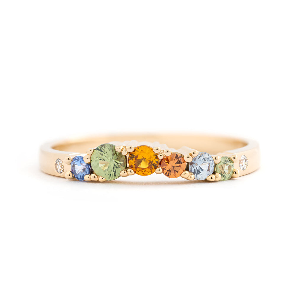 Contour model ring from the Keto Meadow jewelry collection. Made in 18K yellow gold with autumn color sapphires and white diamonds. Design by Jussi Louesalmi, Au3 Goldsmiths.