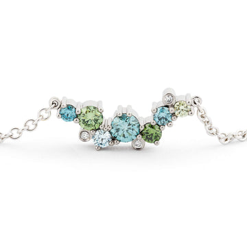 Keto Meadow Crown necklace with treated turquoise and green diamonds and white tw/vs diamonds by goldsmith Jussi Louesalmi, Au3 Goldsmiths.