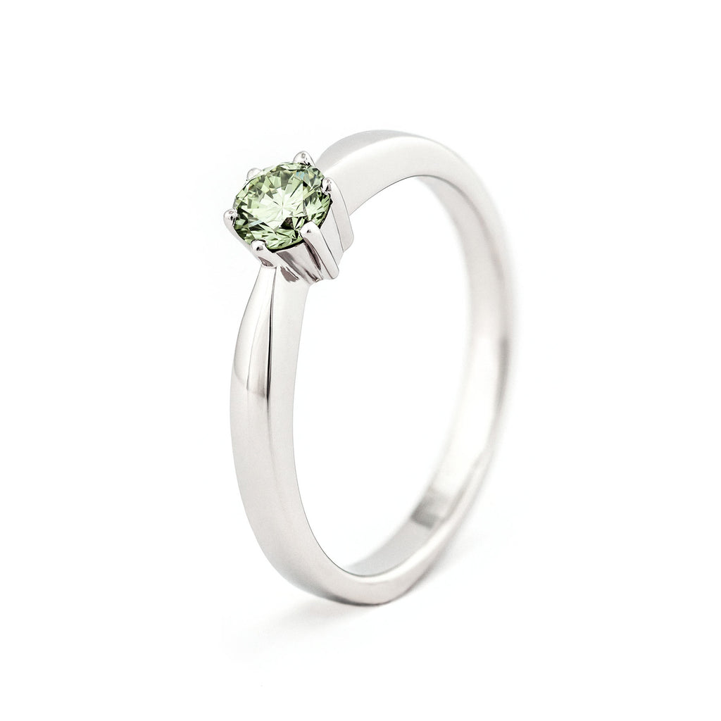 3,5mm diameter Pine Green color diamond in a Keto Meadow ONE solitaire ring made in 18K white gold. Design by Jussi Louesalmi, Au3 Goldsmiths. 