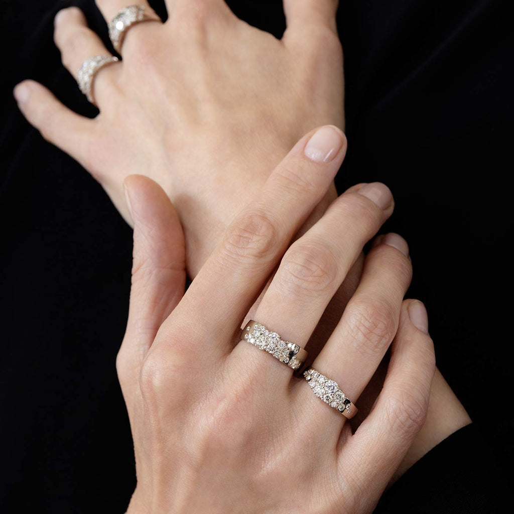 Model wearing Keto Meadow diamond rings, design by Jussi Louesalmi, Au3 Goldsmiths