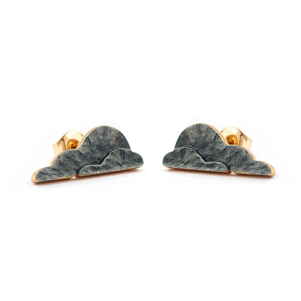 Cloud shape earrings, dark surface, gold lining. Materials gold plated and oxidized 925 silver. Design Anu Kaartinen, Au3 Goldsmiths.