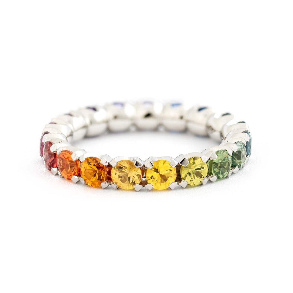 Colorful sapphires in the Rainbow alliance ring crafted from 18K white gold. Design by Jussi Louesalmi, Au3 Goldsmiths.