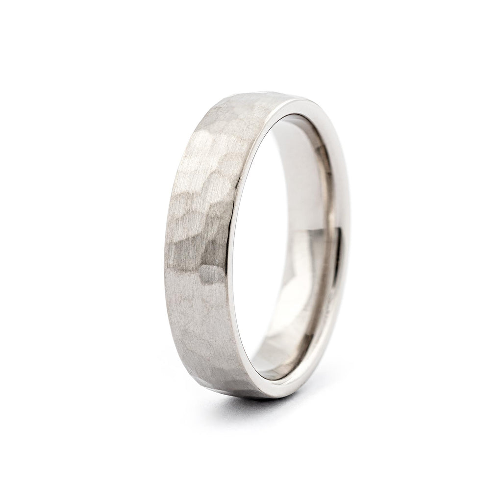 Hammered matte finish in this Taottu ring in white gold, design by Jussi Louesalmi, Au3 Goldsmiths