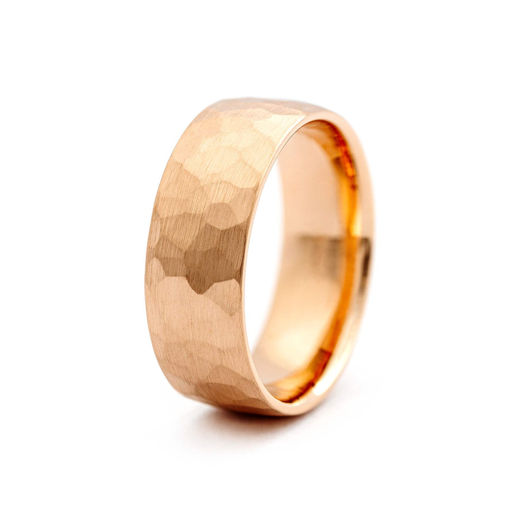 Hand-hammered surface in the 8mm wide men's ring made in 18K rose gold by Au3 Goldsmiths