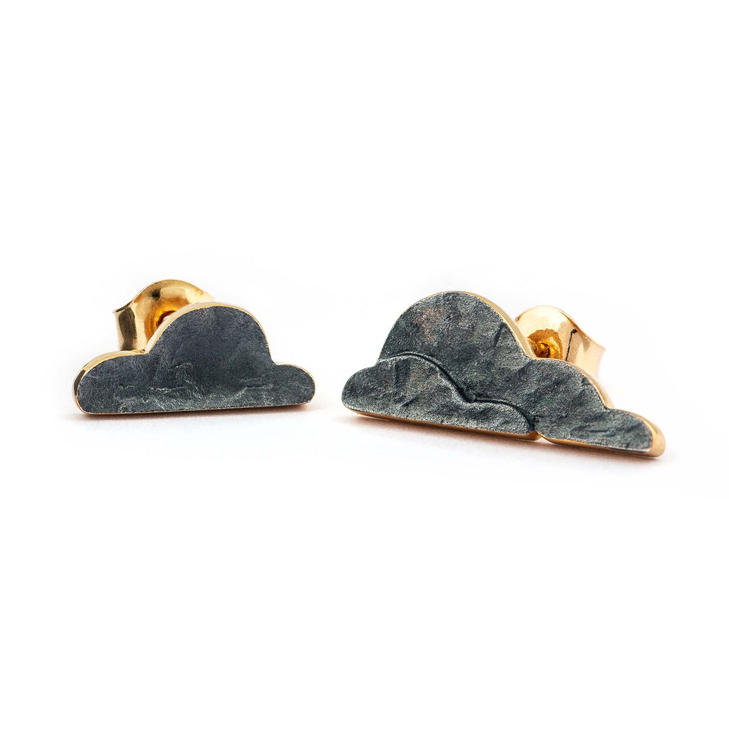 Dark patinated gold plated cloudy shaped stud earrings with a gold lining, design by Anu Kaartinen, Au3 Goldsmiths