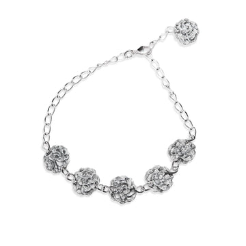 Eudora silver bracelet with 6 round elements covered with grey enamel. Design by Anu Kaartinen.