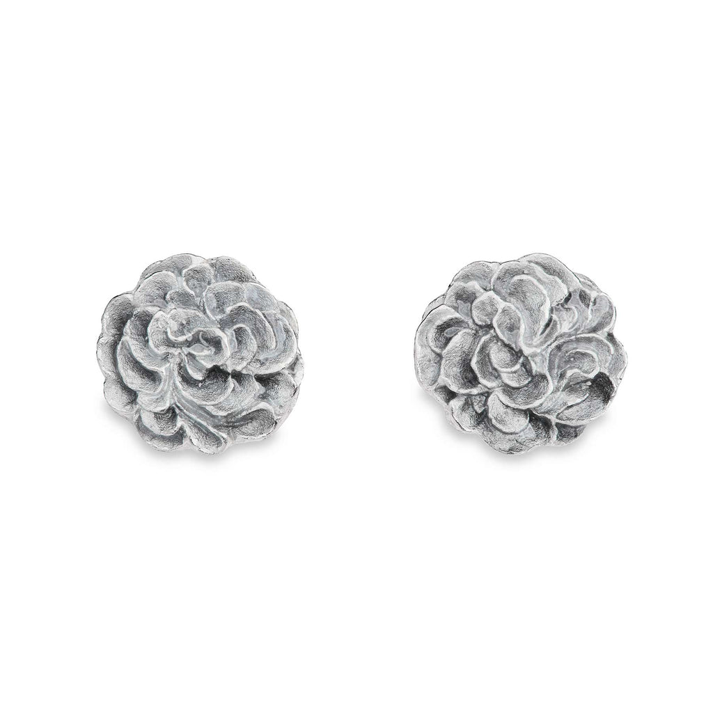 Round stud earrings in silver. Grey enamel on the surface. Design by Anu Kaartinen, Au3 Goldsmiths