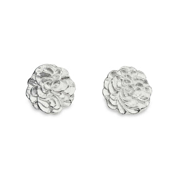 Round stud earrings in silver. Design by Anu Kaartinen, Au3 Goldsmiths