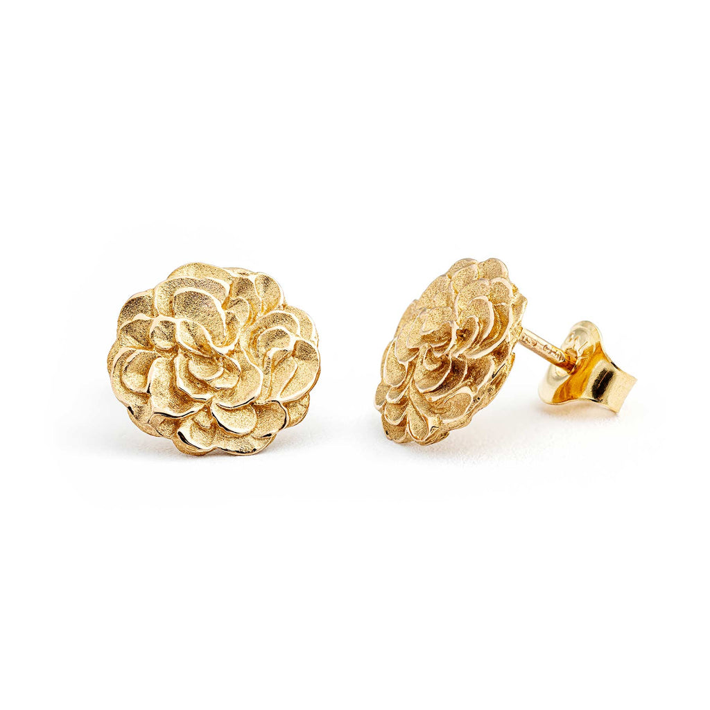 Round stud earrings in 750 rose gold, design by Anu Kaartinen