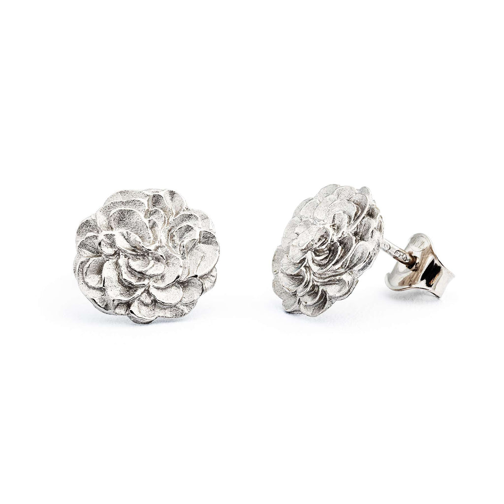 Round stud earrings in 750 white gold, design by Anu Kaartinen