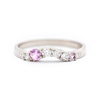 Curvy Keto Meadow Arc+ Spring collection's ring in 750 white gold, with 6 white diamonds and 2 pink sapphires. Design by Jussi Louesalmi, Au3 Goldsmiths. 