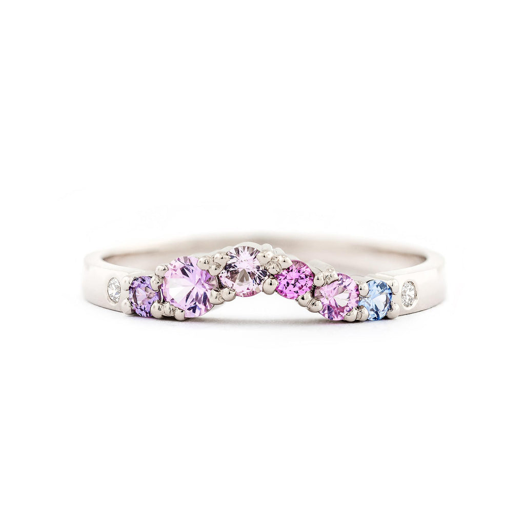 Keto Meadow Arc+ ring with pink, blue and violet sapphires and white diamonds. Suits well next to a solitaire ring. Design by Jussi Louesalmi, Au3 Goldsmiths.