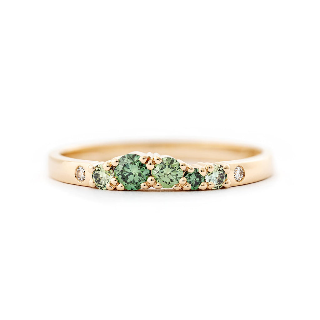 Narrow 2mm wide Keto Meadow ring in 750 yellow gold with green diamonds and white tw/vs diamonds. Design by Jussi Louesalmi, Au3 Goldsmiths.