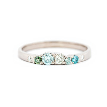 Vivid turquoise and green diamonds in 2mm wide Keto Meadow ring, design by Jussi Louesalmi, Au3 Goldsmiths.