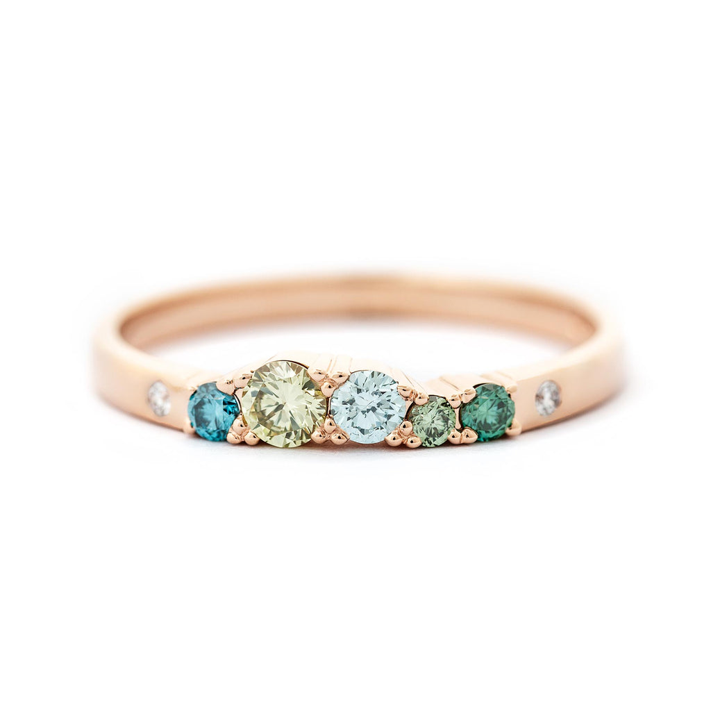 Narrow 2mm wide Keto Meadow ring in 750 gold with green and turquoise diamonds and white tw/vs diamonds. Design by Jussi Louesalmi, Au3 Goldsmiths.