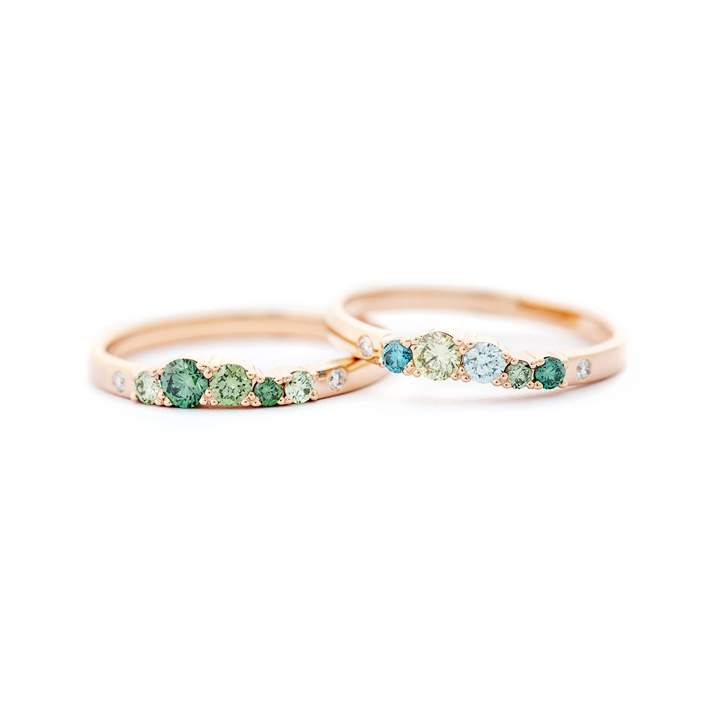 Vivid and slender 2mm wide Keto Meadow rings in 750 gold with green and turquoise diamonds and white tw/vs diamonds. Design by Jussi Louesalmi, Au3 Goldsmiths.