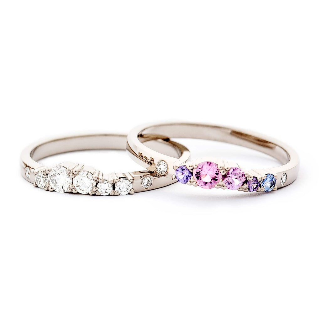 2mm wide Keto Meadow rings, with white diamonds and pink, violet and blue sapphires. Design by Jussi Louesalmi, Au3 Goldsmiths.