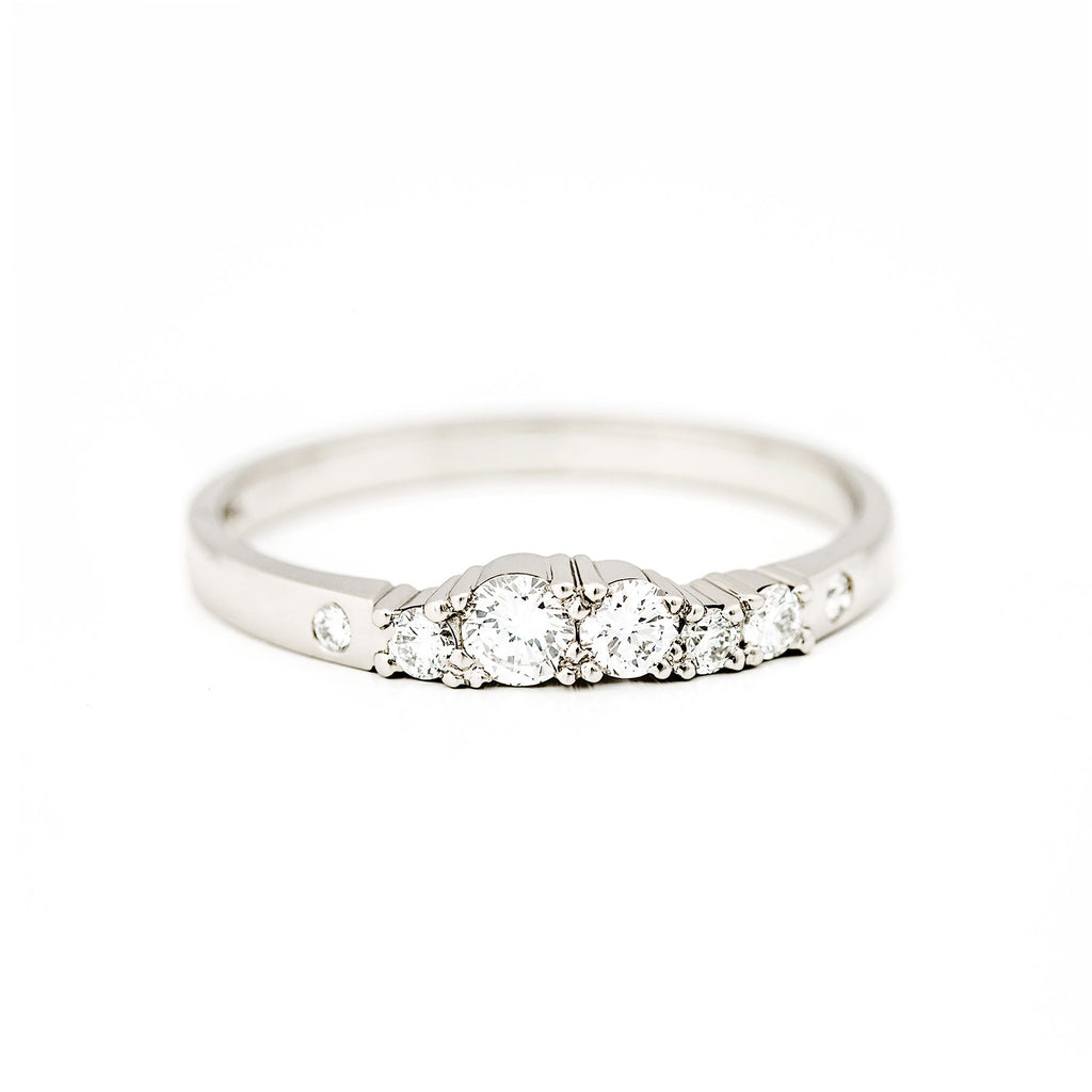 Narrow 2mm wide Keto Meadow ring with white tw/vs diamonds, made in 750 white gold. Design Jussi Louesalmi, Au3 Goldsmiths. 