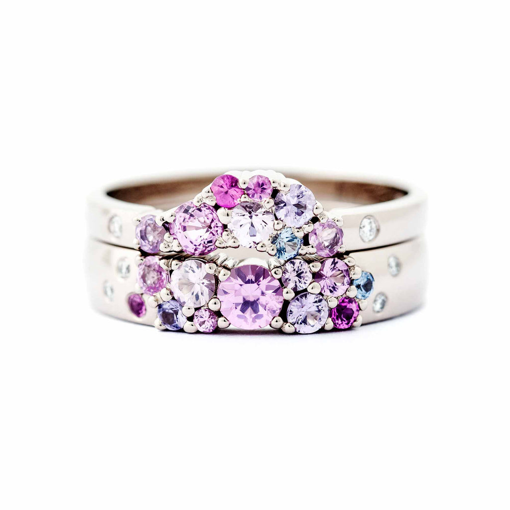 Keto Meadow 4mm wide ring and 2mm Tiara ring combined, with pink, purple and blue sapphires and white tw/vs diamonds. Design by Jussi Louesalmi, Au3 Goldsmiths.