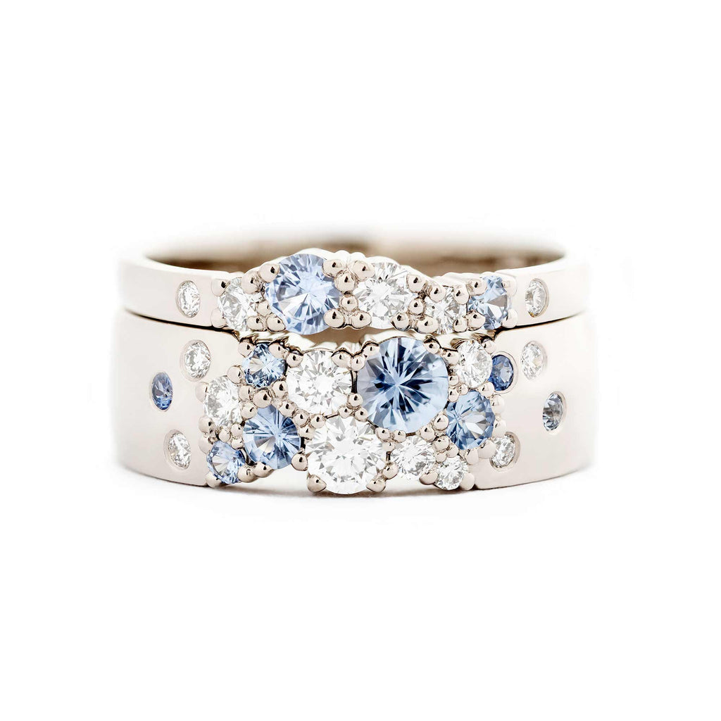 Keto Meadow Spring collection's 6mm and 2mm wide rings with pastel blue sapphires and white tw/vs diamonds. Design by Jussi Louesalmi, Au3 Goldsmiths.