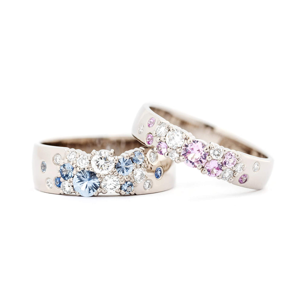 Keto Meadow Spring collection's 6mm wide ring with pastel blue sapphires and white tw/vs diamonds together with 4mm wide ring with pastel pink color sapphires and white tw/vs diamonds. Design by Jussi Louesalmi, Au3 Goldsmiths.