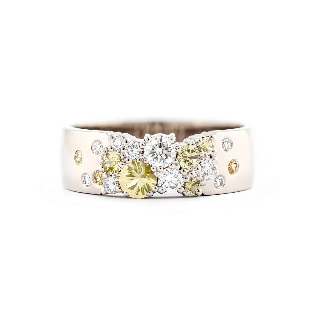 6mm wide Keto Meadow Spring collection's ring with pastel yellow sapphires and white tw/vs diamonds. Design by Jussi Louesalmi, Au3 Goldsmiths.