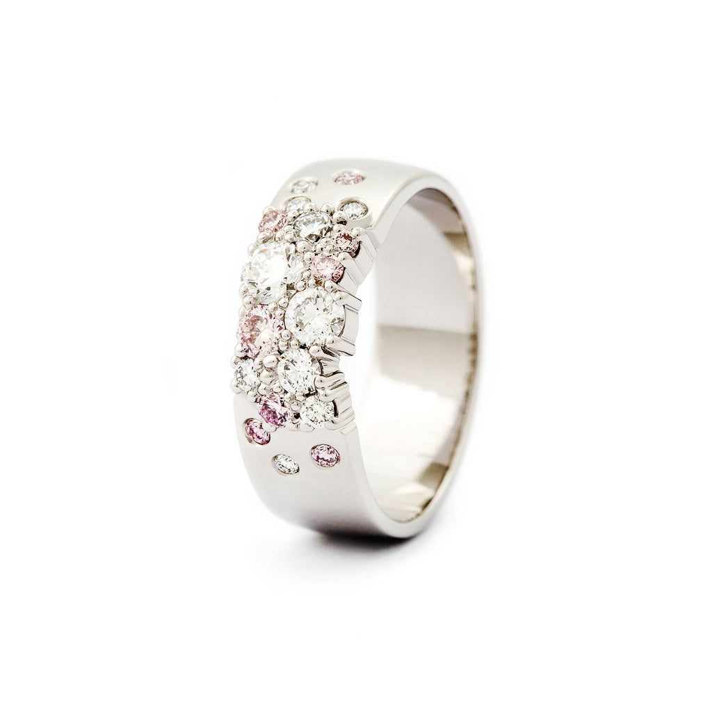 6mm wide Keto Meadow ring in 950 platinum with natural fancy pink diamonds and white tw/vs diamonds. Design by Jussi Louesalmi, Au3 Goldsmiths.