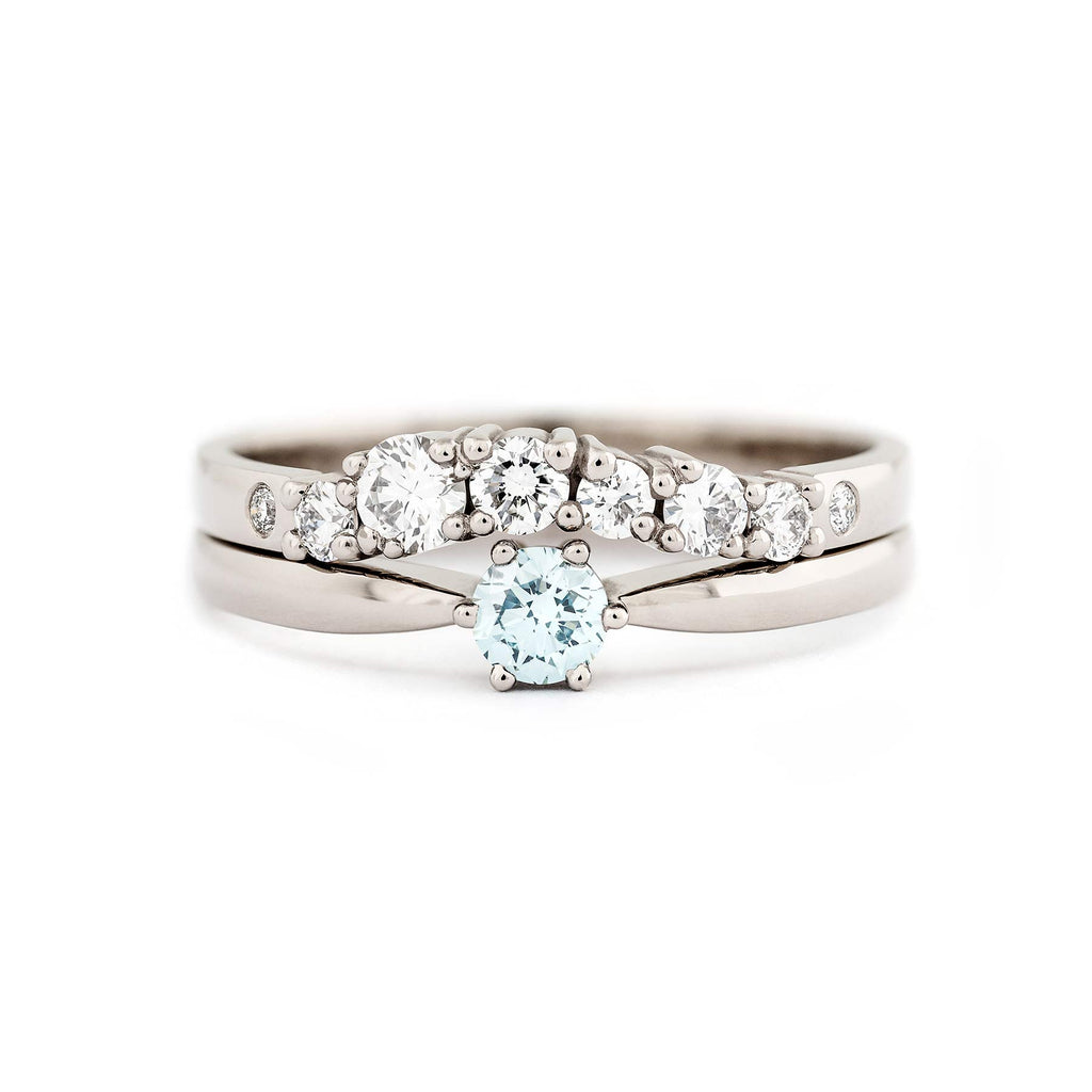 Keto Meadow Arc diamond ring combined with Keto Meadow One Ice Blue solitaire ring. Design by Jussi Louesalmi, Au3 Goldsmiths.