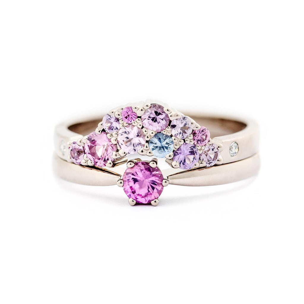 Keto Meadow One ring with pink sapphire, together with Keto Meadow Tiara+ ring with pink, purple and blue sapphires, and white tw/vs diamonds. Design by Jussi Louesalmi, Au3 Goldsmiths. 