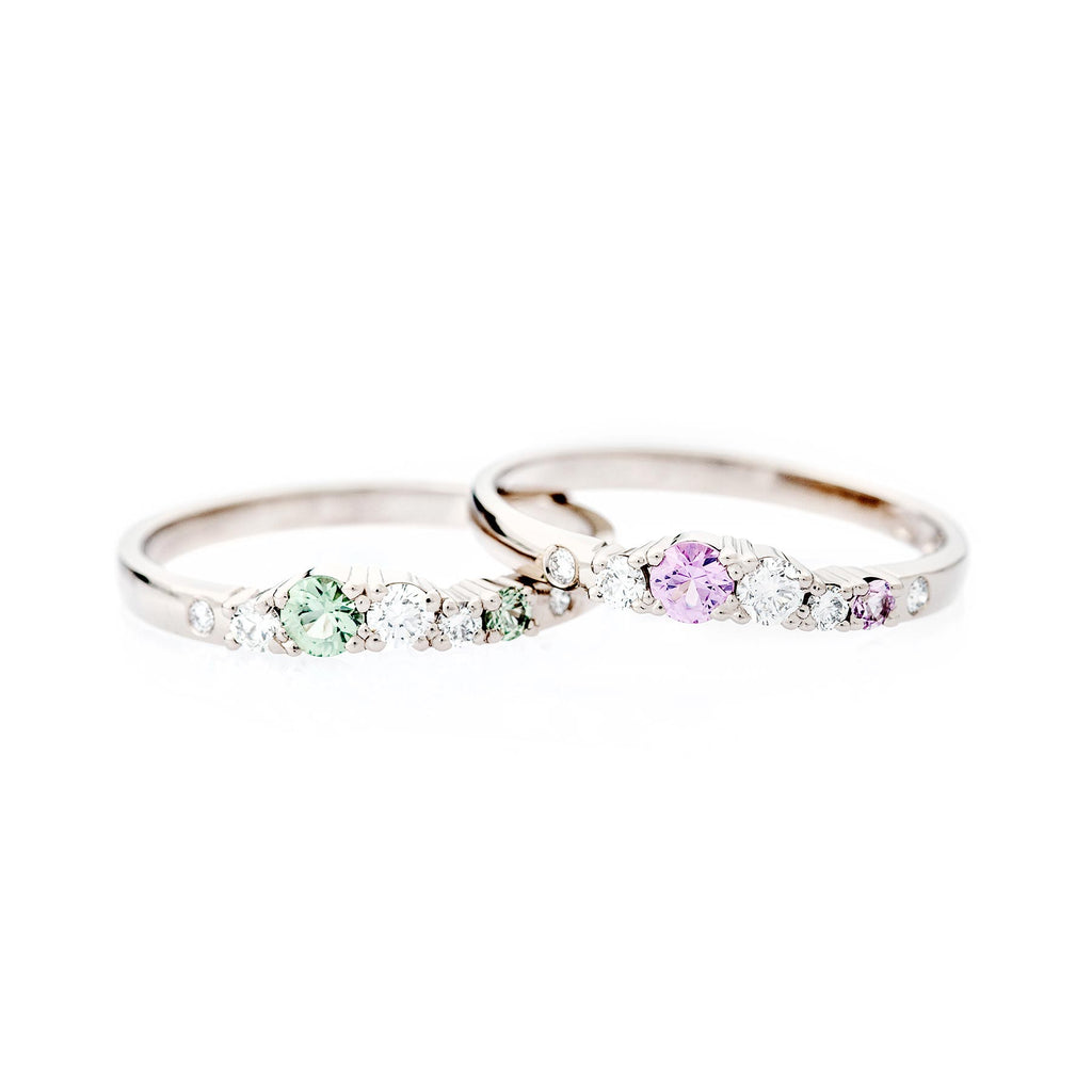 Narrow Keto Meadow rings with pastel green and pastel pink sapphires and white tw/vs diamonds. Design by Jussi Louesalmi, Au3 Goldsmiths.