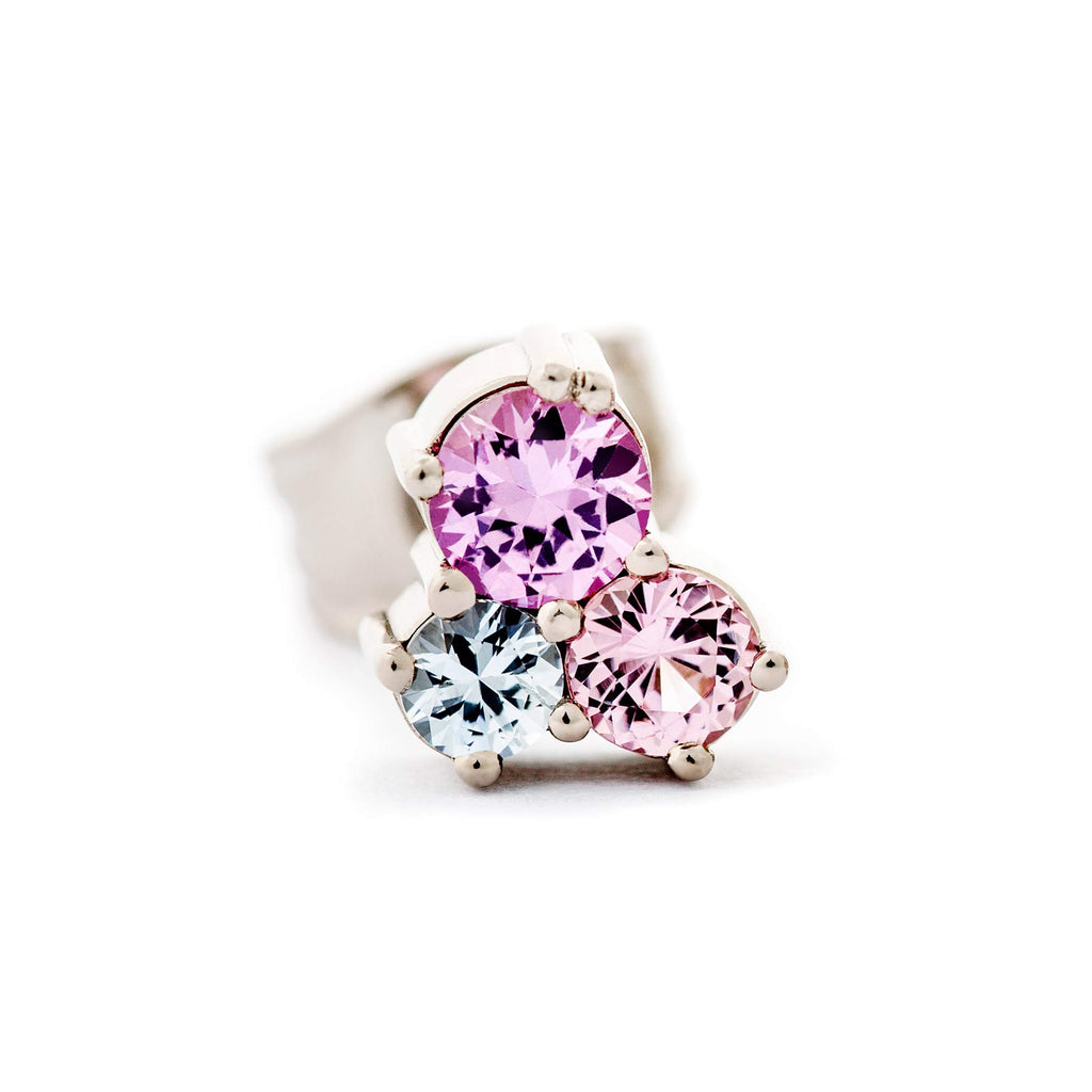 Cute stud earring with different size colorful sapphires. Design by Jussi Louesalmi, Au3 Goldsmiths.