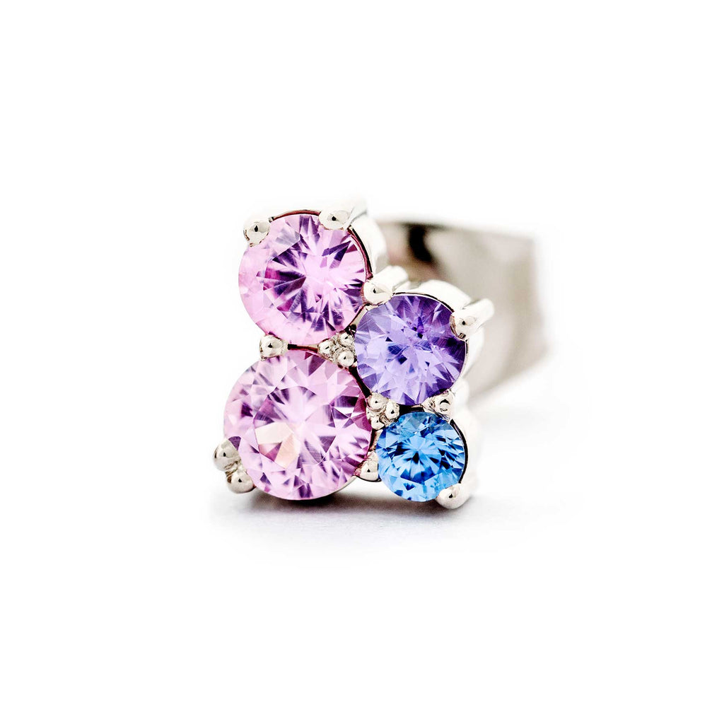 Keto Meadow stud earring with 4 different size and color sapphires. Design by Jussi Louesalmi, Au3 Goldsmiths.