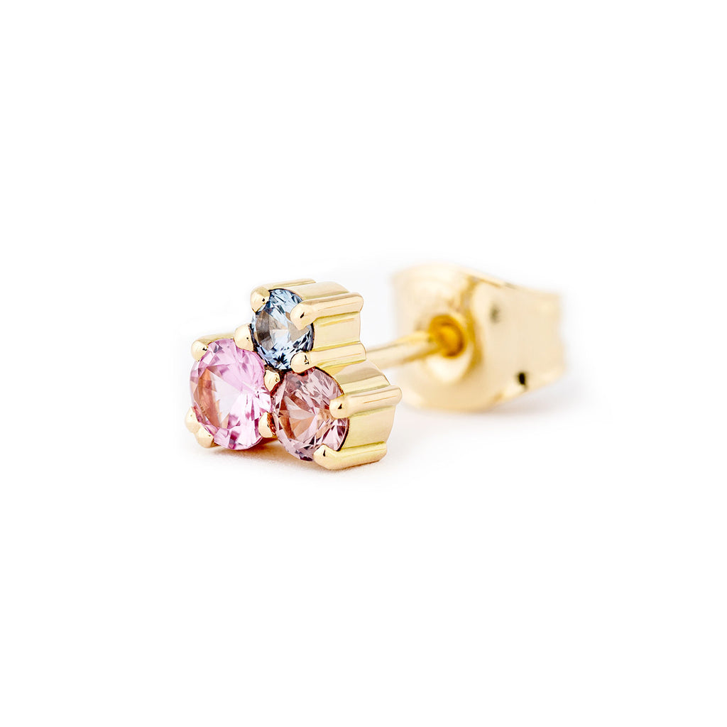 Stud earring in 750 yellow gold, with 3 different size colorful sapphires. Design by Jussi Louesalmi, Au3 Goldsmiths.