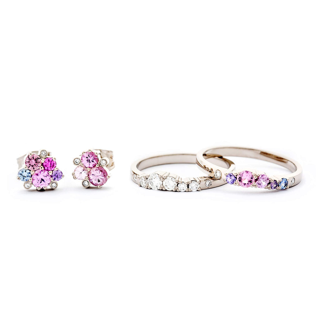Keto Meadow stud earrings and two rings with pink, blue and violet sapphires and white tw/vs diamonds, design by Jussi Louesalmi, Au3 Goldsmiths.