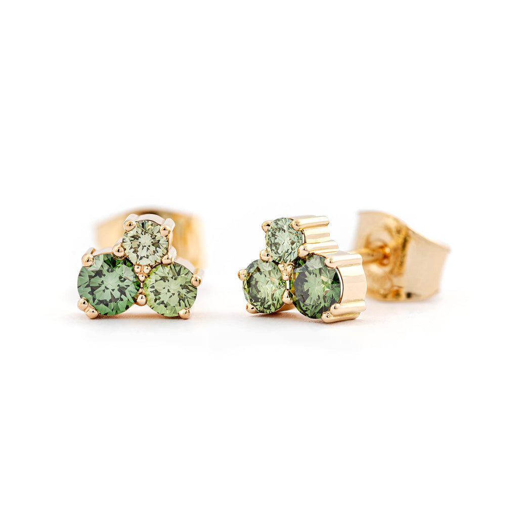 Three vivid green diamonds in each of the Keto Meadow stud earrings. Design by Jussi Louesalmi, Au3 Goldsmiths. 