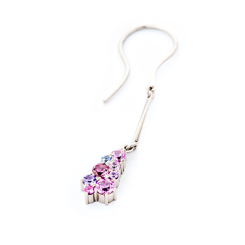 Hanging drop shaped earring, with pink, violet and blue sapphires. Design by Jussi Louesalmi, Au3 Goldsmiths.
